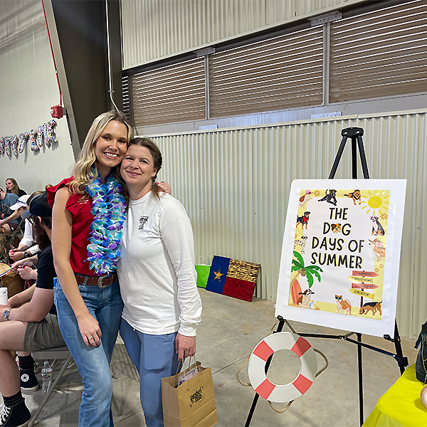 Bentley (left) at a spring dog adoption event with Dr. Trista Mills