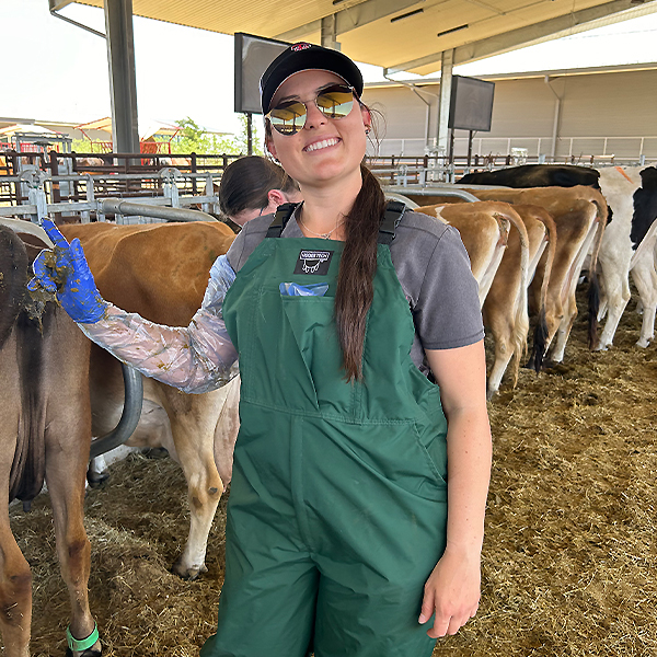 Makayla after palpating a cow