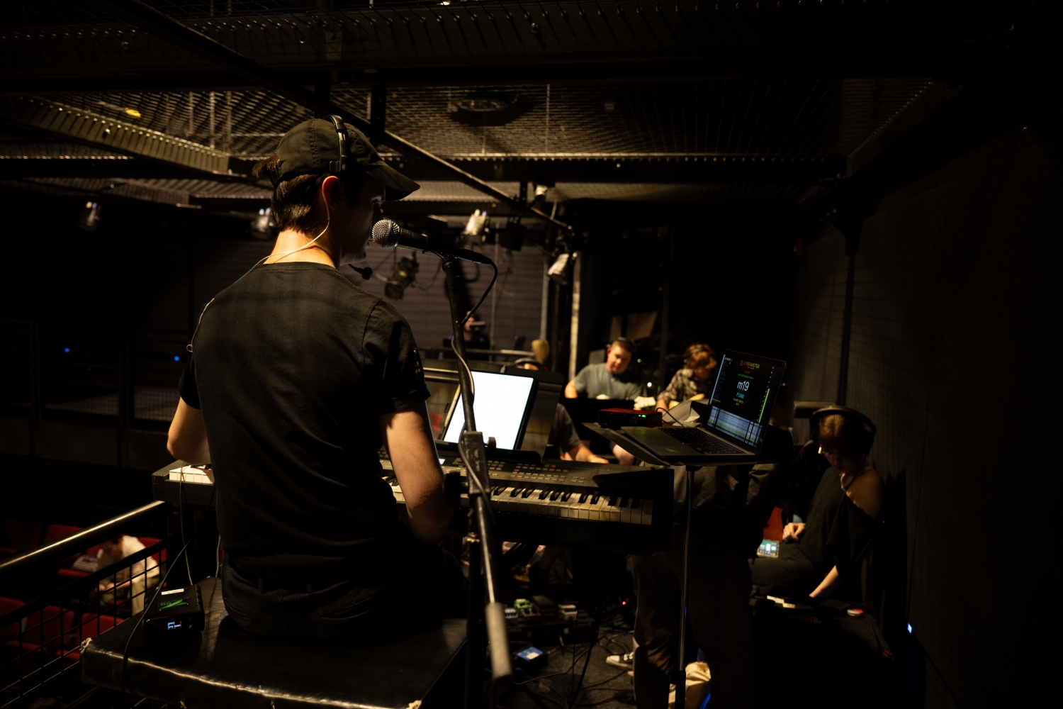 Seb Archibald music directing during production of Lizzie