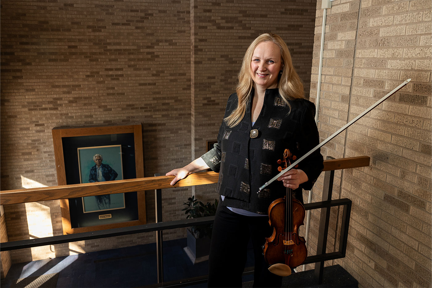 Chalex-Boyle poses with violin