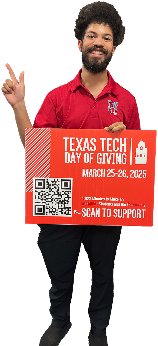 Student holding Day of Giving sign